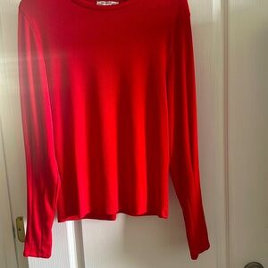 small beautifully ribbed long sleeve top. Red. Tapered stitching in sleeves
